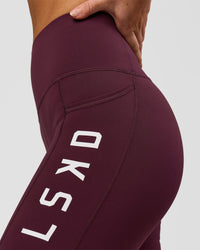 Woman wearing Rep Ultra High-Rise 6" Short Pockets - Cherry Lacquer-White | Model:Issy | Size:XS | Thumbnail Index: 3