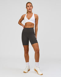 Woman wearing Rep Ultra High-Rise 6" Short Pockets - Onyx-white | Model:Issy | Size:XS | Thumbnail Index: 6