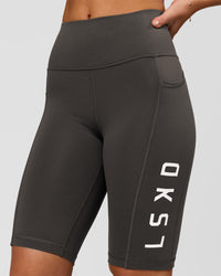 Woman wearing Rep Ultra High-Rise 9" Short Pockets - Onyx-white | Model:Issy | Size:XS | Thumbnail Index: 2