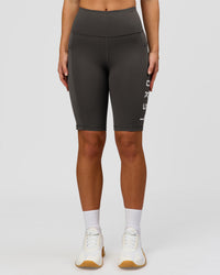 Woman wearing Rep Ultra High-Rise 9" Short Pockets - Onyx-white | Model:Issy | Size:XS | Thumbnail Index: 3