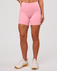 Woman wearing RXD Mid-Rise 6" Short - Pink Rose | Model:Issy | Size:XS | Thumbnail Index: 3