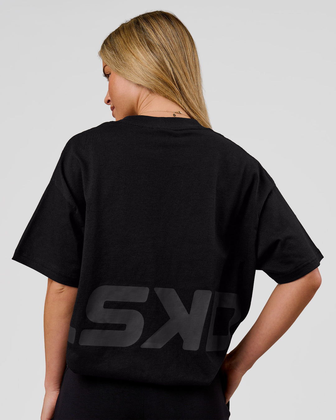 Woman wearing Shadow Mark Heavyweight Oversized Tee - Black-Onyx | Model:Issy | Size:XS - view 3