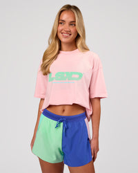 Woman wearing Sideline FLXCotton Oversized Tee - Marshmallow-Jelly Mint | Model:Issy | Size:XS | Thumbnail Index: 0