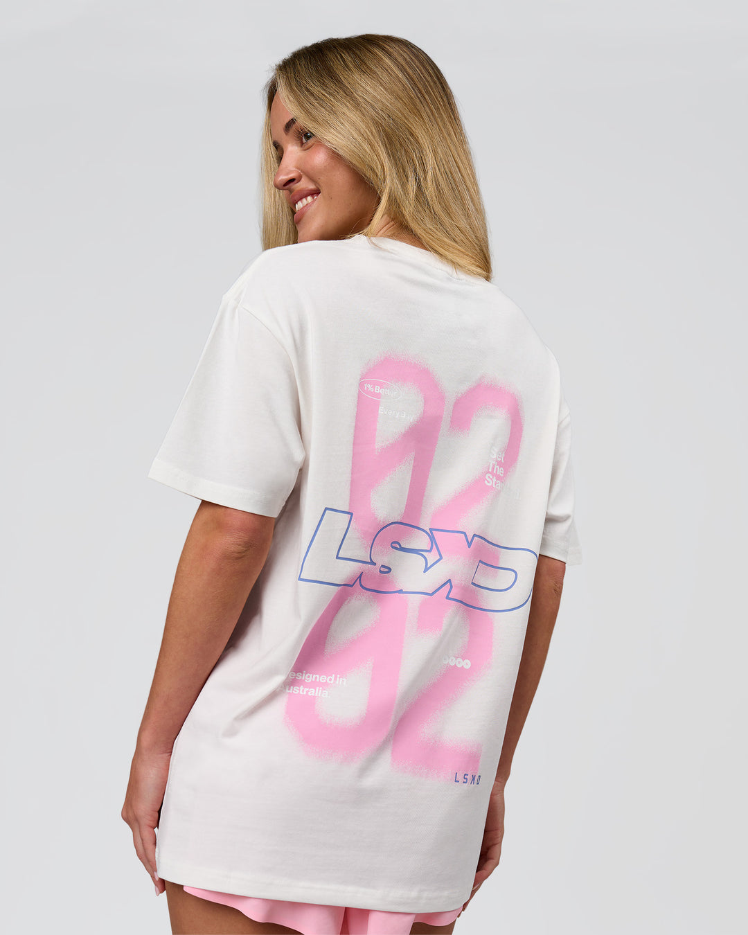 Woman wearing SoCal 26 FLXCotton Oversize Tee  - Off White-Pink Rose | Model:Issy | Size:XS - view 18