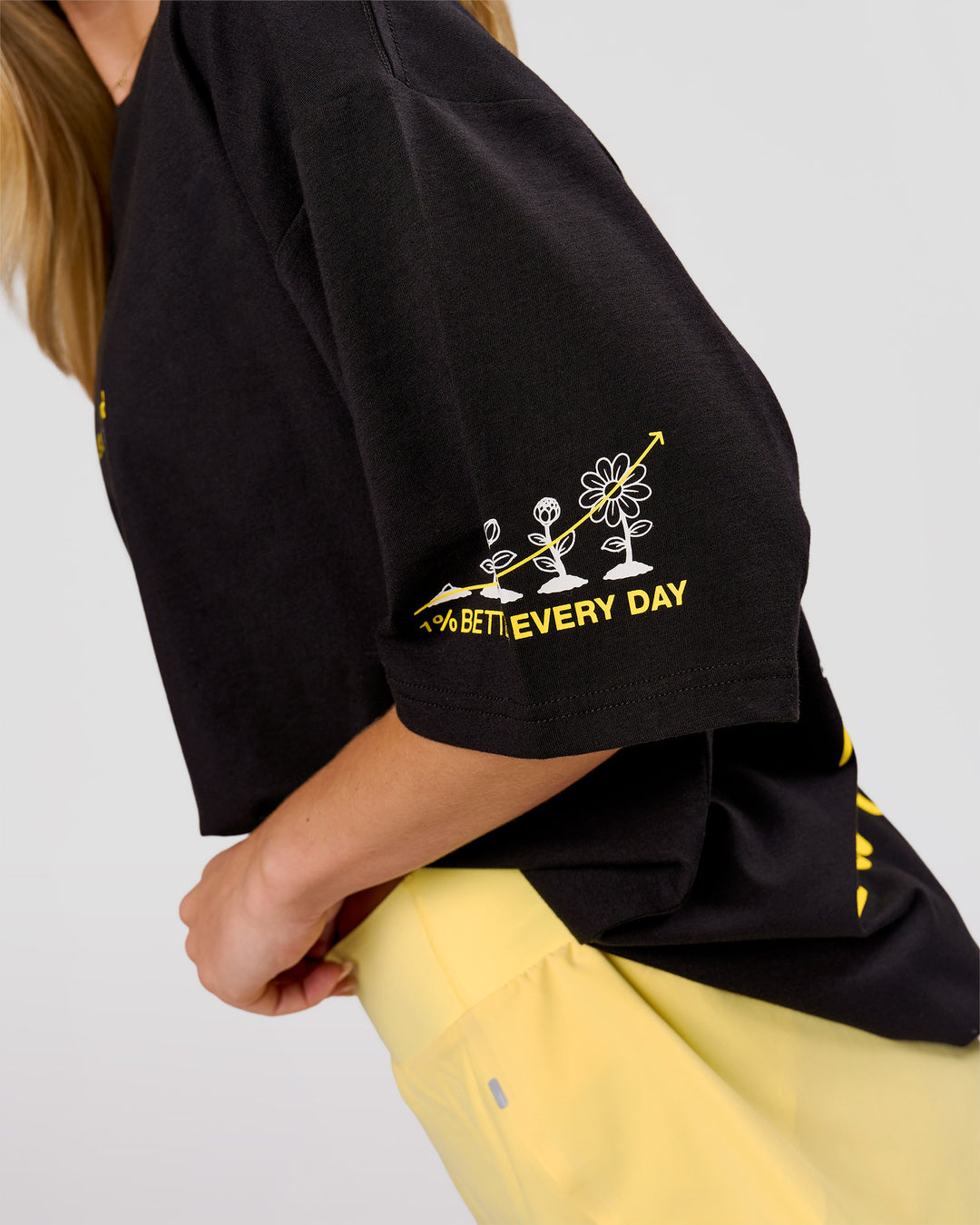 Woman wearing TGHF X LSKD 26 FLXCotton Oversized Tee - Black | Model:Issy | Size:XS - view 10