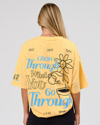Woman wearing TGHF X LSKD 26 FLXCotton Oversized Tee - Lemon | Model:Issy | Size:XS | Thumbnail Index: 1