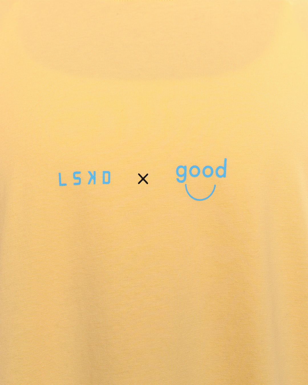 Woman wearing TGHF X LSKD 26 FLXCotton Oversized Tee - Lemon | Model:Issy | Size:XS - view 10