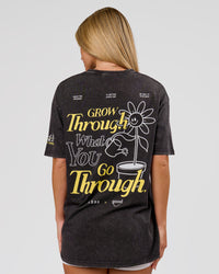 Woman wearing TGHF X LSKD 26 FLXCotton Oversized Tee - Black Washed | Model:Issy | Size:XS | Thumbnail Index: 1