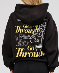 Woman wearing TGHF X LSKD 26 Oversized Hoodie - Black | Model:Issy | Size:XS | Thumbnail Index: 1