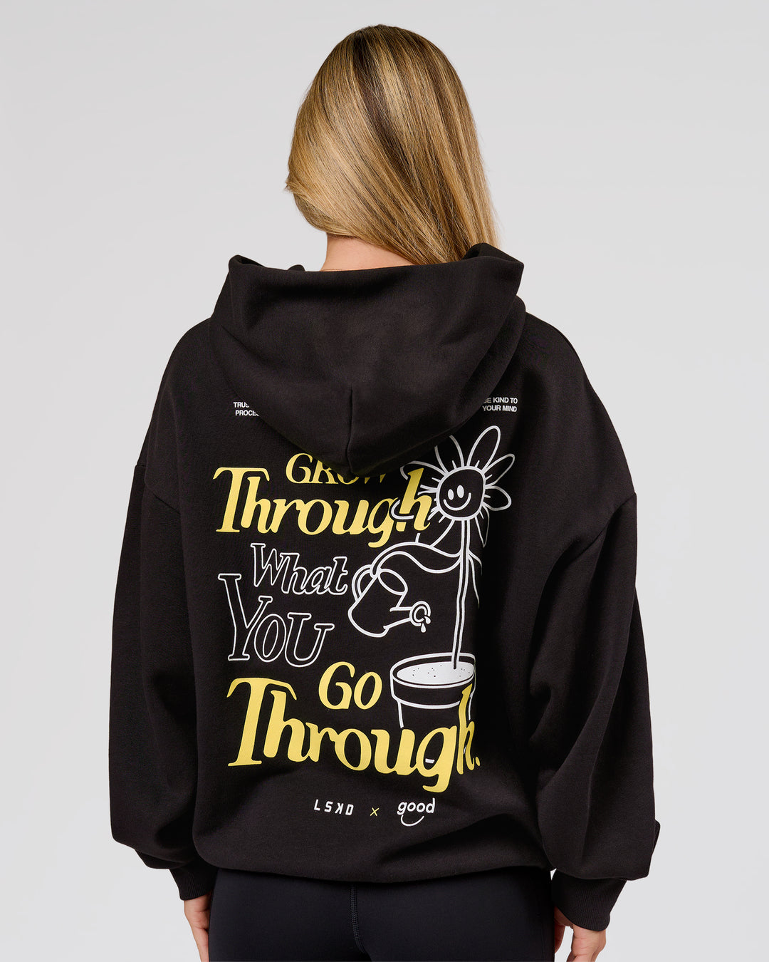 Woman wearing TGHF X LSKD 26 Oversized Hoodie - Black | Model:Issy | Size:XS - view 6