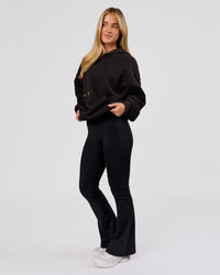 Woman wearing TGHF X LSKD 26 Oversized Hoodie - Black | Model:Issy | Size:XS | Thumbnail Index: 13