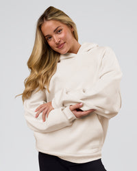 Woman wearing Tonal Legacy Boxy Hoodie - Off White-Off White | Model:Issy | Size:XS | Thumbnail Index: 21