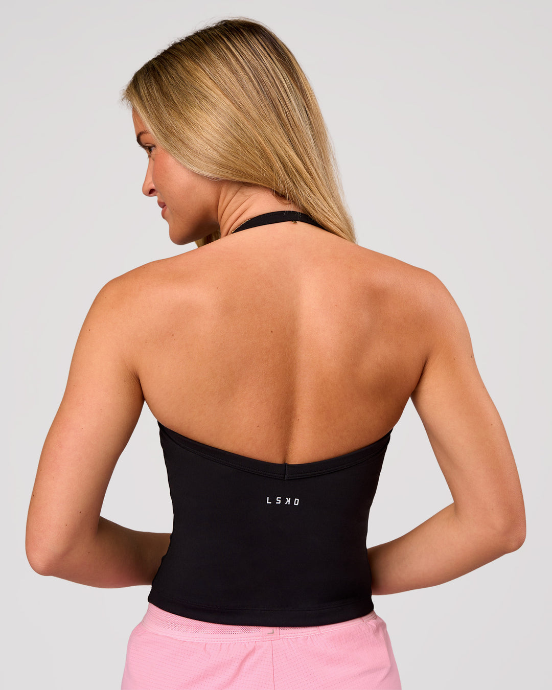 Woman wearing Unleash Shelf Bra Tank - Black | Model:Issy | Size:XS - view 3