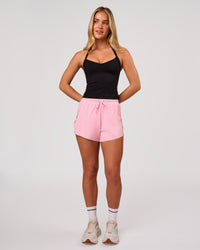 Woman wearing Unleash Shelf Bra Tank - Black | Model:Issy | Size:XS | Thumbnail Index: 4