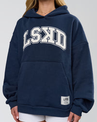 Woman wearing Varsity Boxy Hoodie - Future Navy-White | Model:Issy | Size:XS | Thumbnail Index: 15
