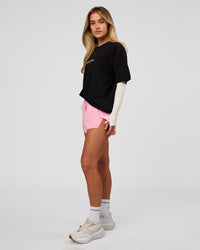 Woman wearing VS1 Enjoy The Journey FLXCotton Oversize Tee - Black | Model:Issy | Size:XS | Thumbnail Index: 7