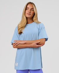 Woman wearing VS26 Journey FLXCotton Oversize Tee - Open Air-Lemon | Model:Issy | Size:XS | Thumbnail Index: 3