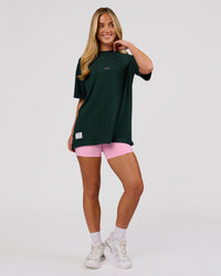 Woman wearing VS26 MFBS FLXCotton Oversize Tee - Midnight Green-Pink Rose | Model:Issy | Size:XS | Thumbnail Index: 5