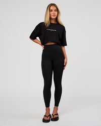 Woman wearing VS6 1% Better FLXCotton Oversize Tee - Black | Model:Issy | Size:XS | Thumbnail Index: 5