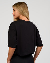 Woman wearing VS6 1% Better FLXCotton Oversize Tee - Black | Model:Issy | Size:XS | Thumbnail Index: 9