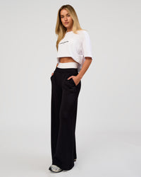 Woman wearing VS6 1% Better FLXCotton Oversize Tee - White | Model:Issy | Size:XS | Thumbnail Index: 9