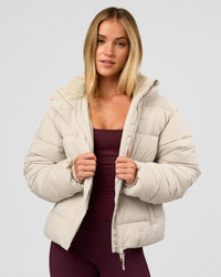 Woman wearing Go-To Puffer Jacket - Shale Beige | Model:Izzy | Size:XS | Thumbnail Index: 5