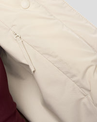 Woman wearing Go-To Puffer Jacket - Shale Beige | Model:Izzy | Size:XS | Thumbnail Index: 6