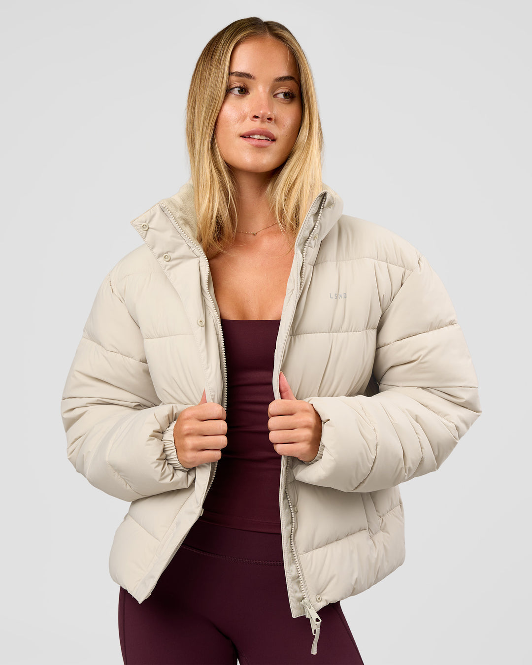 Woman wearing Go-To Puffer Jacket - Shale Beige | Model:Izzy | Size:XS - view 1