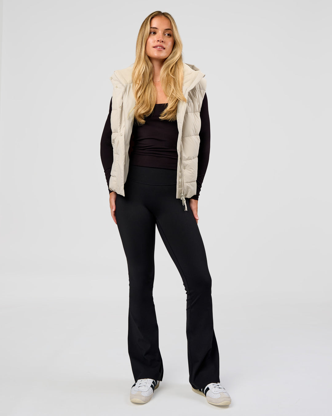 Woman wearing Go-To Puffer Vest - Shale Beige | Model:Izzy | Size:XS - view 3