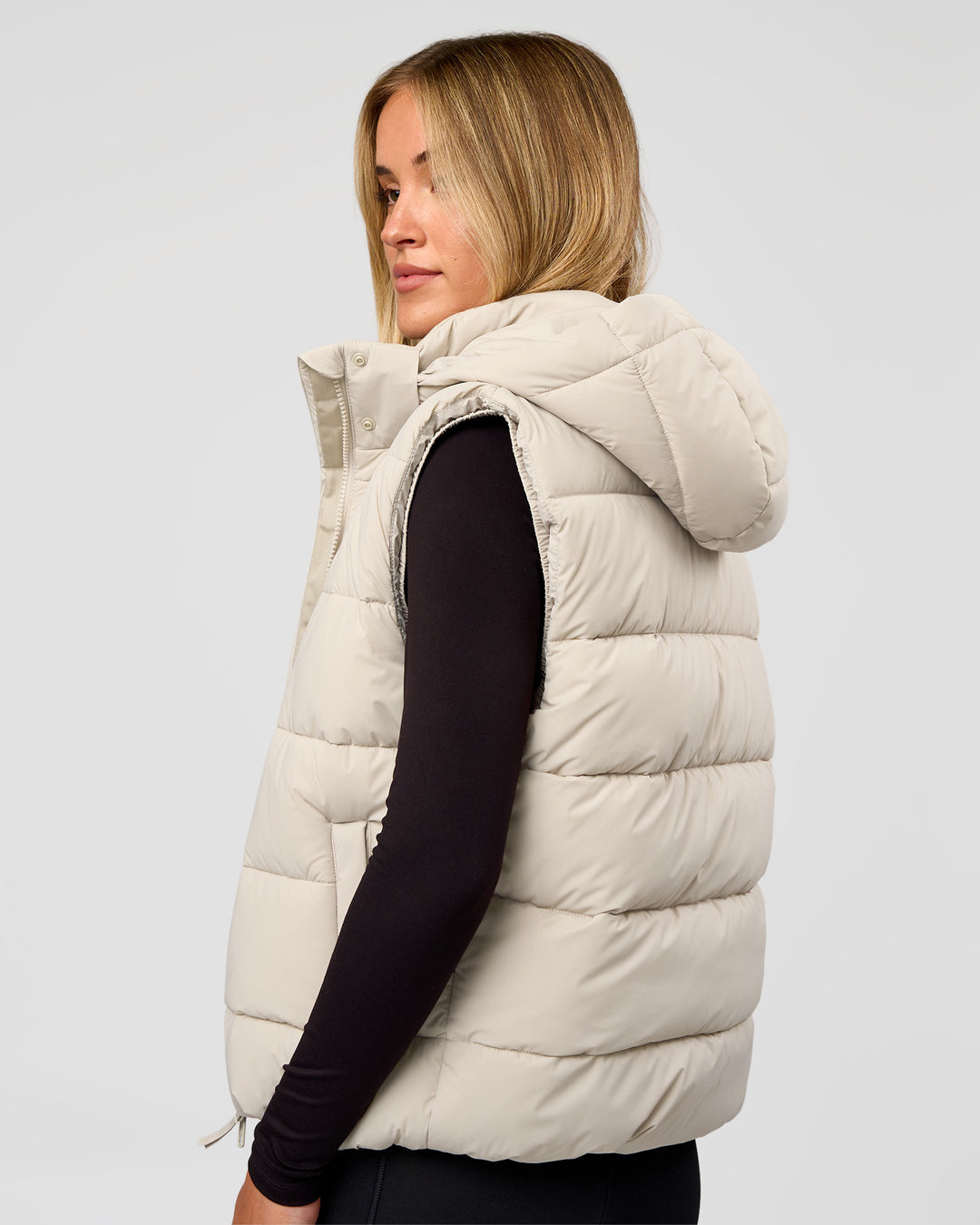 Woman wearing Go-To Puffer Vest - Shale Beige | Model:Izzy | Size:XS - view 2