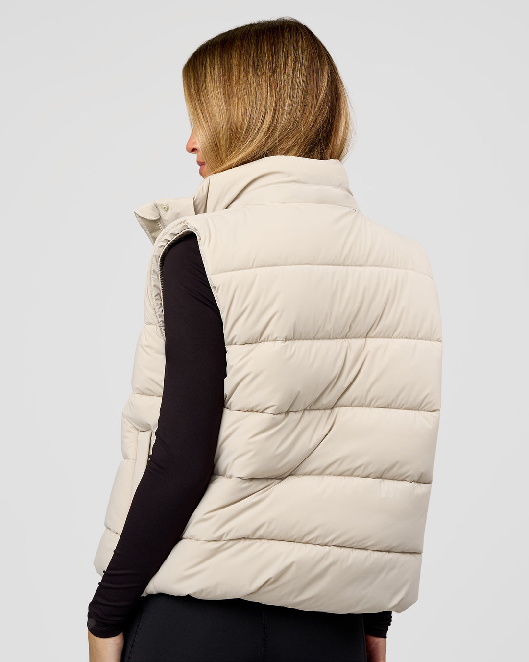Woman wearing Go-To Puffer Vest - Shale Beige | Model:Izzy | Size:XS - view 8