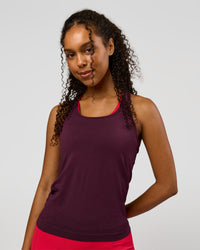 Woman wearing AeroFLX+ Seamless Tank - Cherry Lacquer/Cherry Lacquer | Model:Jordan | Size:XS | Thumbnail Index: 0