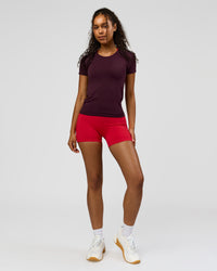 Woman wearing AeroFLX+ Seamless Tee - Cherry Lacquer/Cherry Lacquer | Model:Jordan | Size:XS | Thumbnail Index: 3