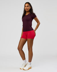 Woman wearing AeroFLX+ Seamless Tee - Cherry Lacquer/Cherry Lacquer | Model:Jordan | Size:XS | Thumbnail Index: 4