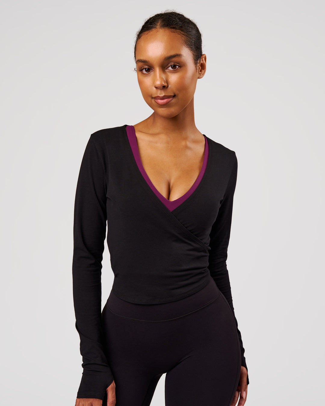 Woman wearing All Day Wrap FLXCotton Long Sleeve Top - Black | Model:Jordan | Size:XS - view 1
