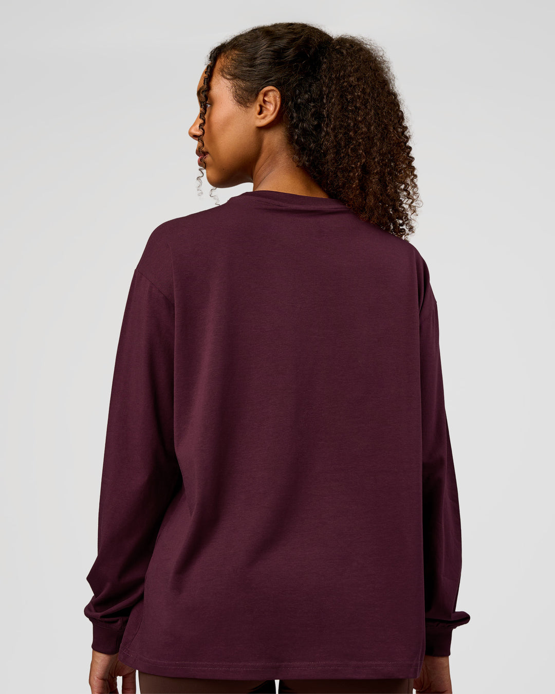 Woman wearing Go-To Long Sleeve FLXCotton Oversized Tee - Cherry Lacquer-White | Model:Jordan | Size:XS - view 3