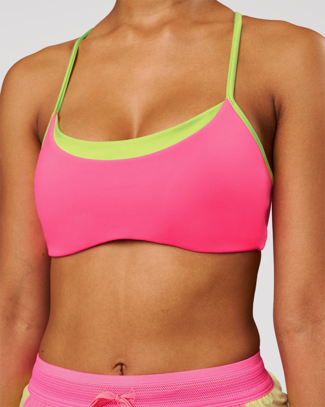 Woman wearing Tempo Sports Bra - Sugar Plum-Lime Glo | Model:Jordan | Size:XS - view 4