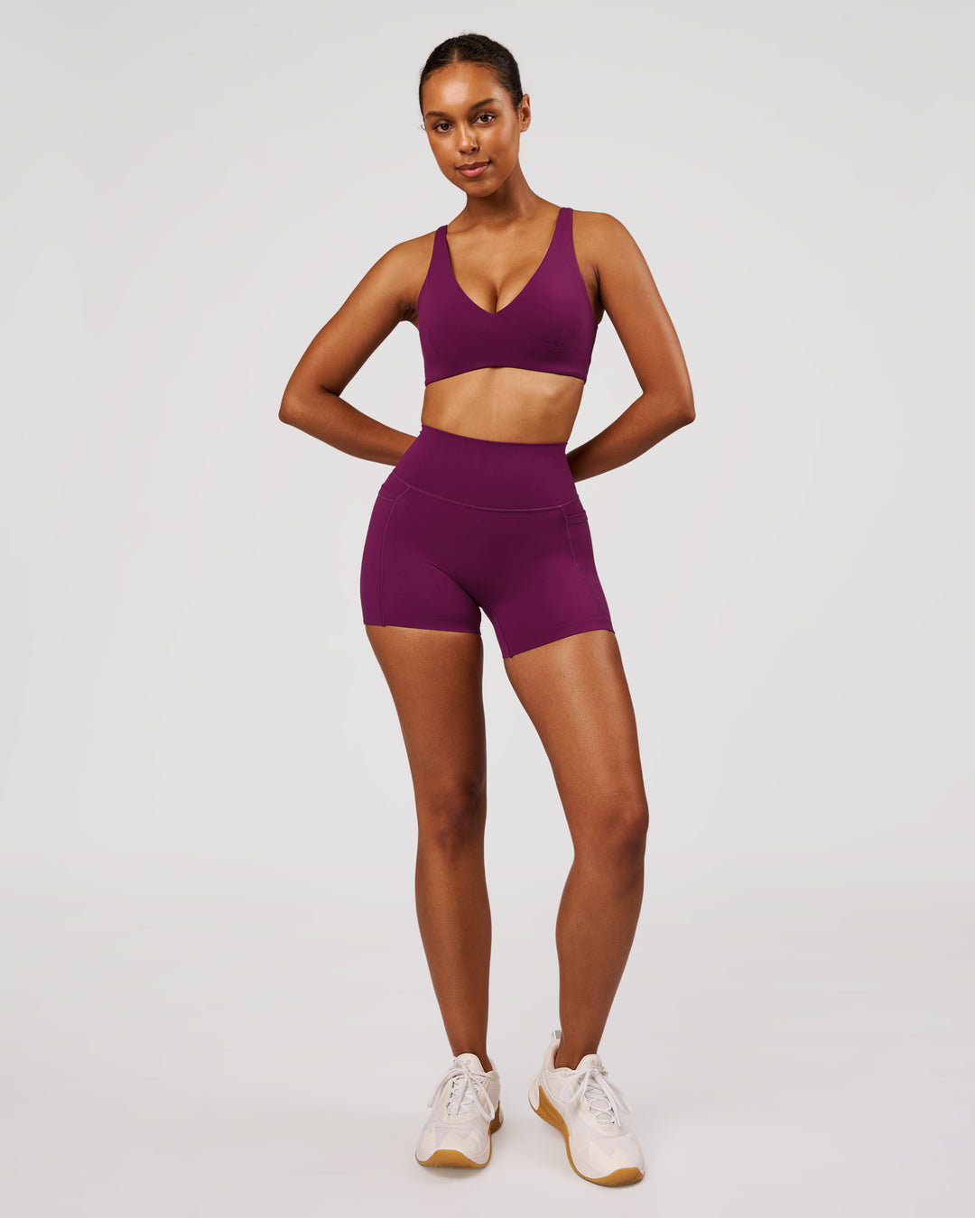 Woman wearing Vitality Sports Bra - Plum Caspia | Model:Jordan | Size:XS - view 6