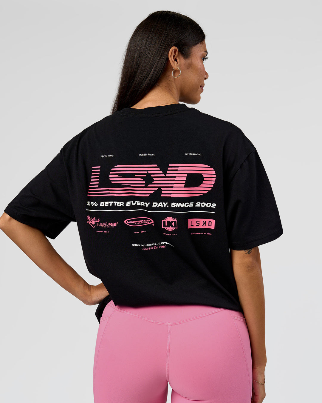 Woman wearing Archive FLXCotton Oversized Tee - Black-Candy Pink | Model:Rhiley | Size:XS - view 3