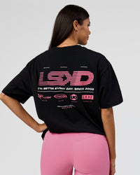 Woman wearing Archive FLXCotton Oversized Tee - Black-Candy Pink | Model:Rhiley | Size:XS | Thumbnail Index: 2