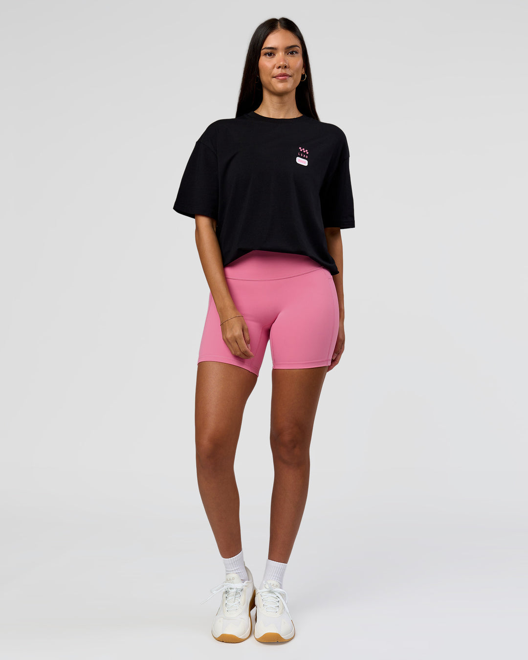 Woman wearing Archive FLXCotton Oversized Tee - Black-Candy Pink | Model:Rhiley | Size:XS - view 6