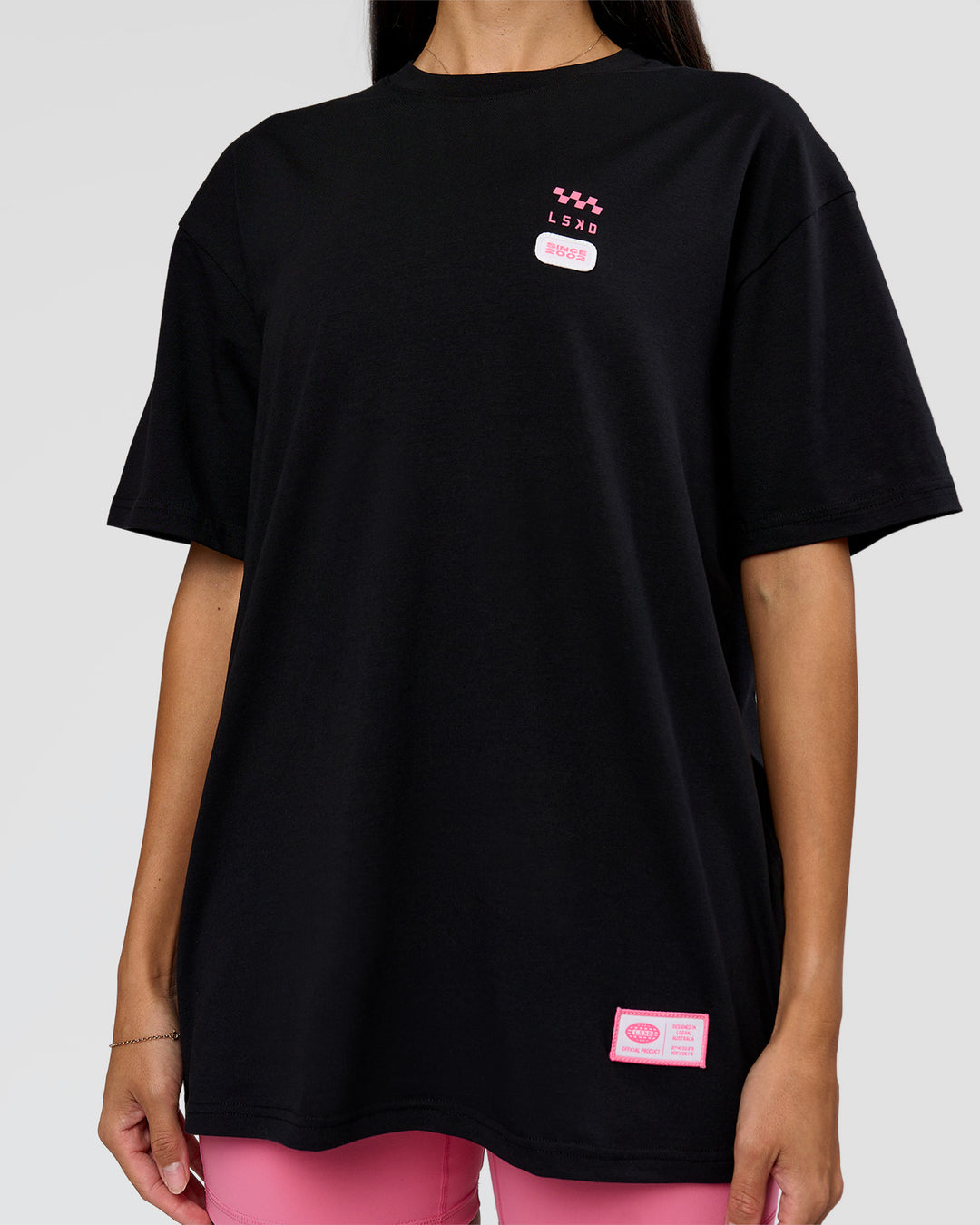 Woman wearing Archive FLXCotton Oversized Tee - Black-Candy Pink | Model:Rhiley | Size:XS - view 14
