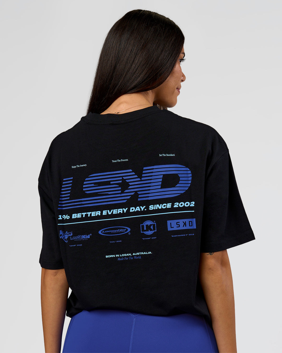 Woman wearing Archive FLXCotton Oversized Tee - Black-Electric Indigo | Model:Rhiley | Size:XS - view 3
