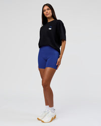 Woman wearing Archive FLXCotton Oversized Tee - Black-Electric Indigo | Model:Rhiley | Size:XS | Thumbnail Index: 10