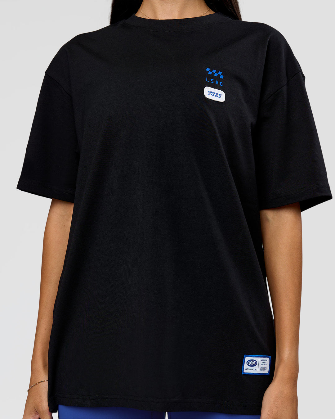 Woman wearing Archive FLXCotton Oversized Tee - Black-Electric Indigo | Model:Rhiley | Size:XS - view 13