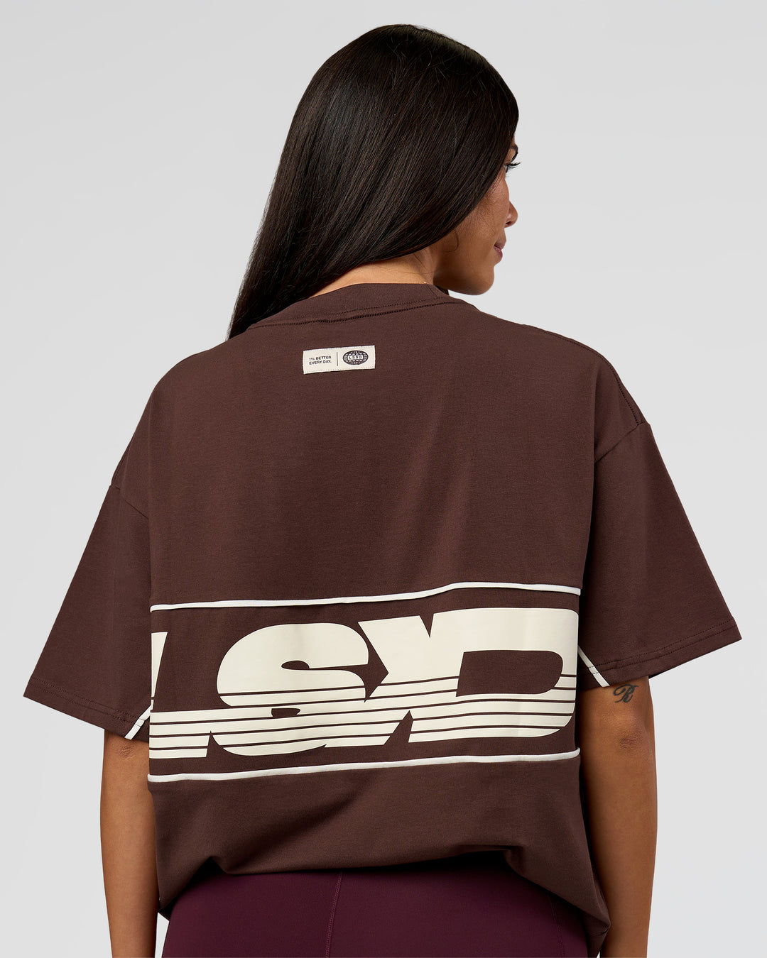 Woman wearing Inline Heavyweight FLXCotton Oversized Tee - Hot Chocolate-Off White | Model:Rhiley | Size:XS - view 3