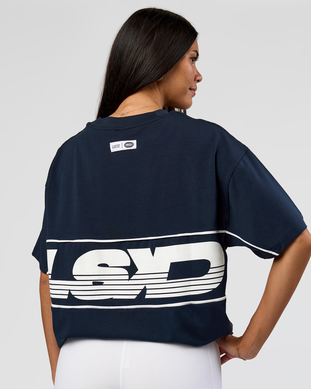 Woman wearing Inline Heavyweight FLXCotton Oversized Tee - Midnight Navy-White | Model:Rhiley | Size:XS - view 3