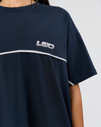 Woman wearing Inline Heavyweight FLXCotton Oversized Tee - Midnight Navy-White | Model:Rhiley | Size:XS | Thumbnail Index: 9