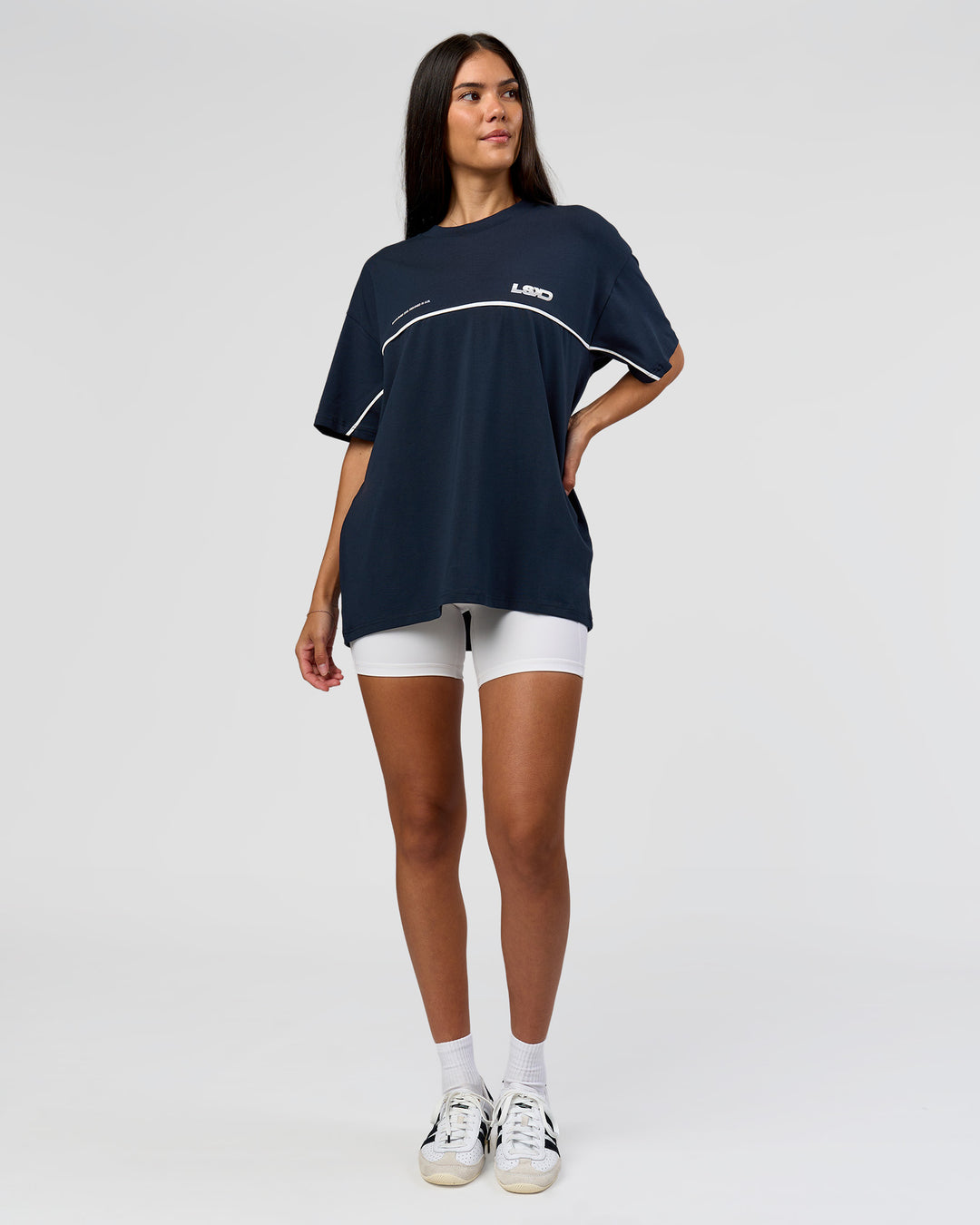Woman wearing Inline Heavyweight FLXCotton Oversized Tee - Midnight Navy-White | Model:Rhiley | Size:XS - view 13