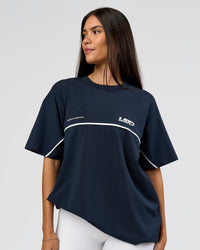 Woman wearing Inline Heavyweight FLXCotton Oversized Tee - Midnight Navy-White | Model:Rhiley | Size:XS | Thumbnail Index: 15